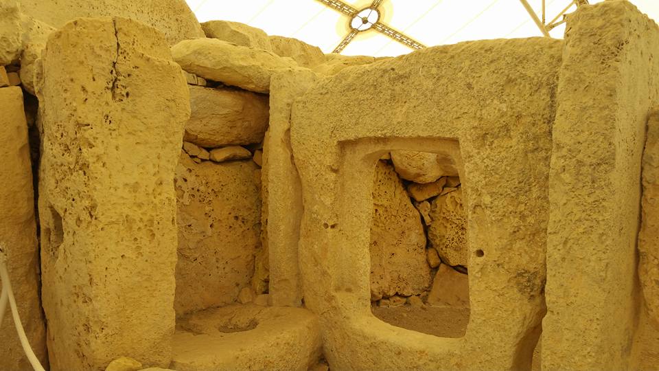 A doorway cut through a single slab of stone at Ħaġar Qim