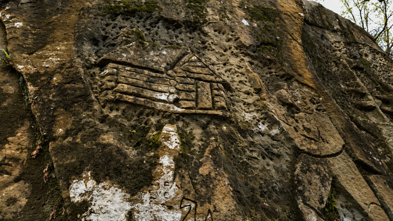 The log cabin on the river-facing side — part of the Lincoln narrative
