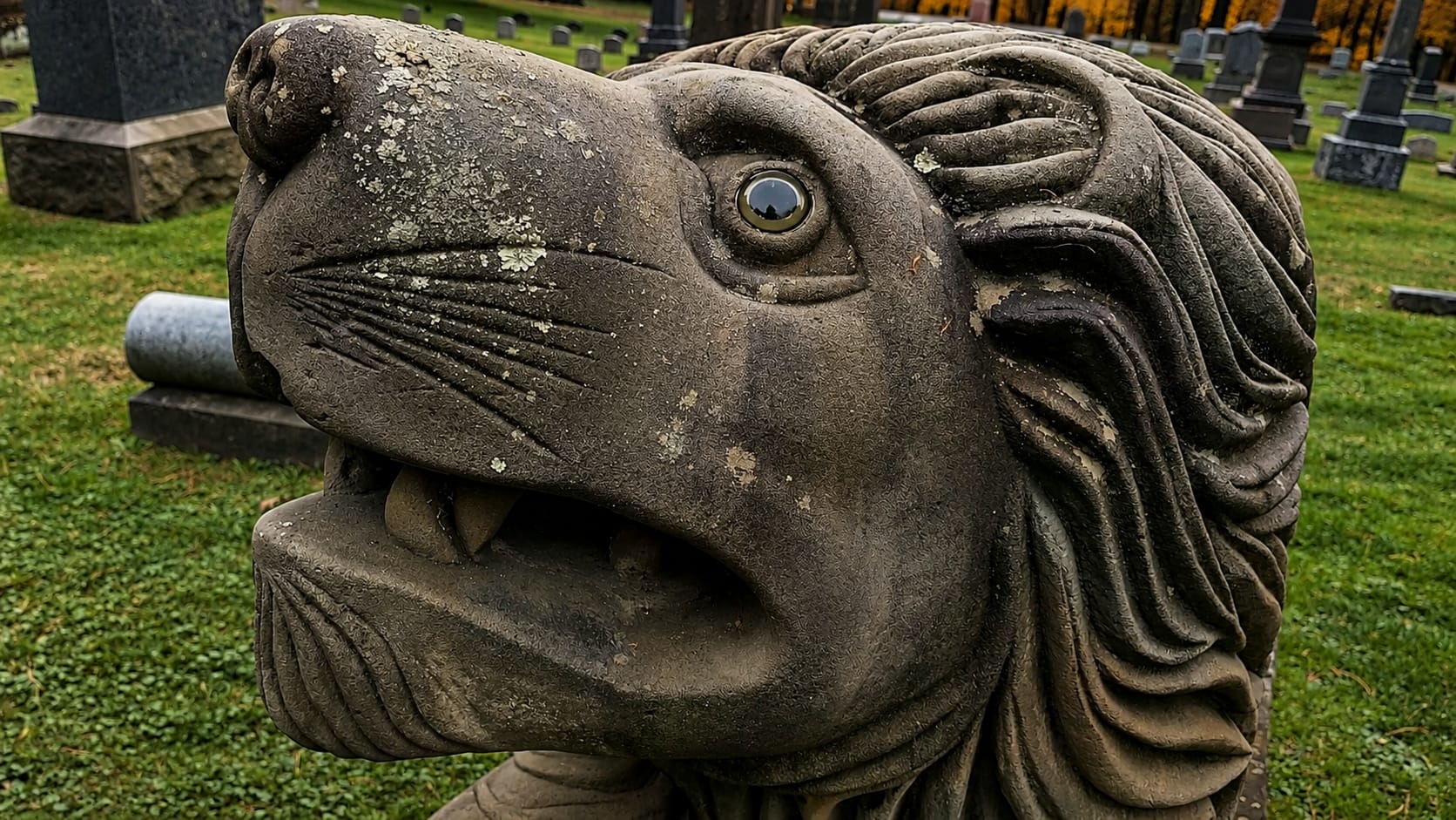 Close-up of the carved lion — taken from Isaiah 11:6, the lion lying down with the lamb