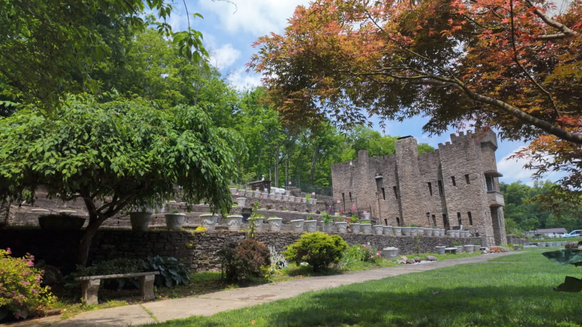 Loveland Castle emerging from the trees along the Little Miami River