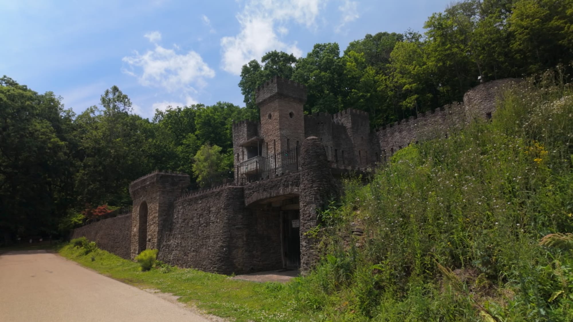 One of the castle's wide exterior views, all of it river stone and hand-cast brick