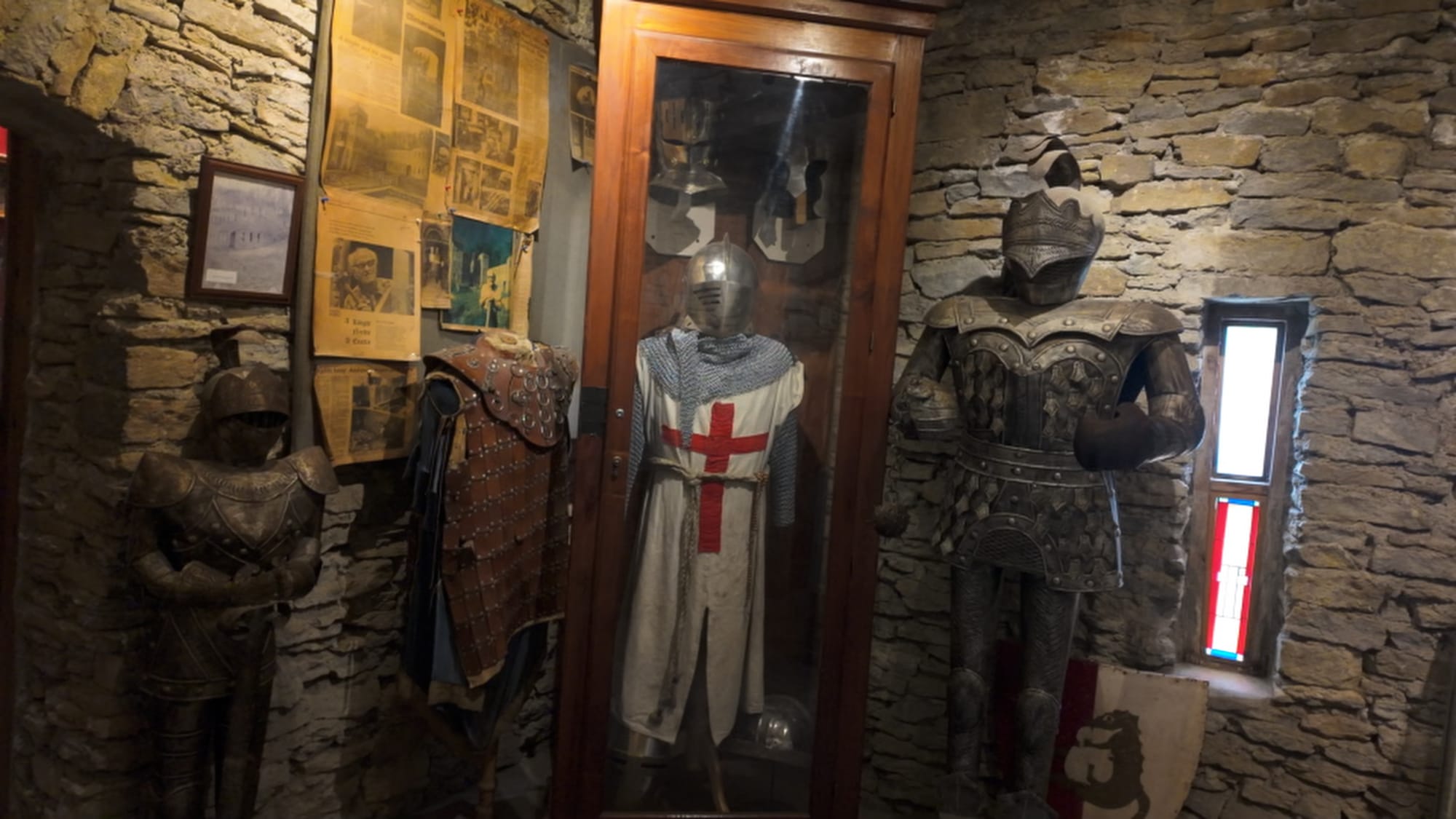 A full suit of armor standing watch inside the castle