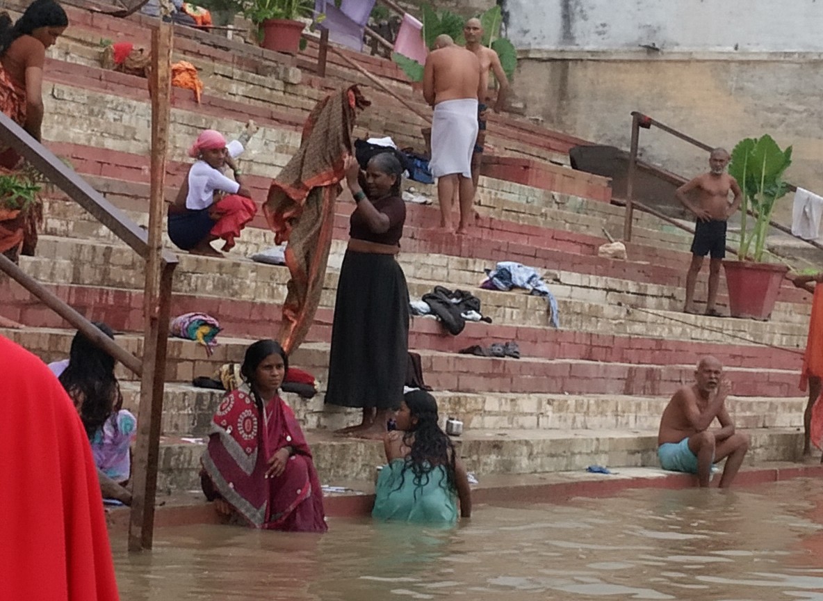Doing laundry in the Ganges — one of the holiest and most polluted rivers on Earth, simultaneously