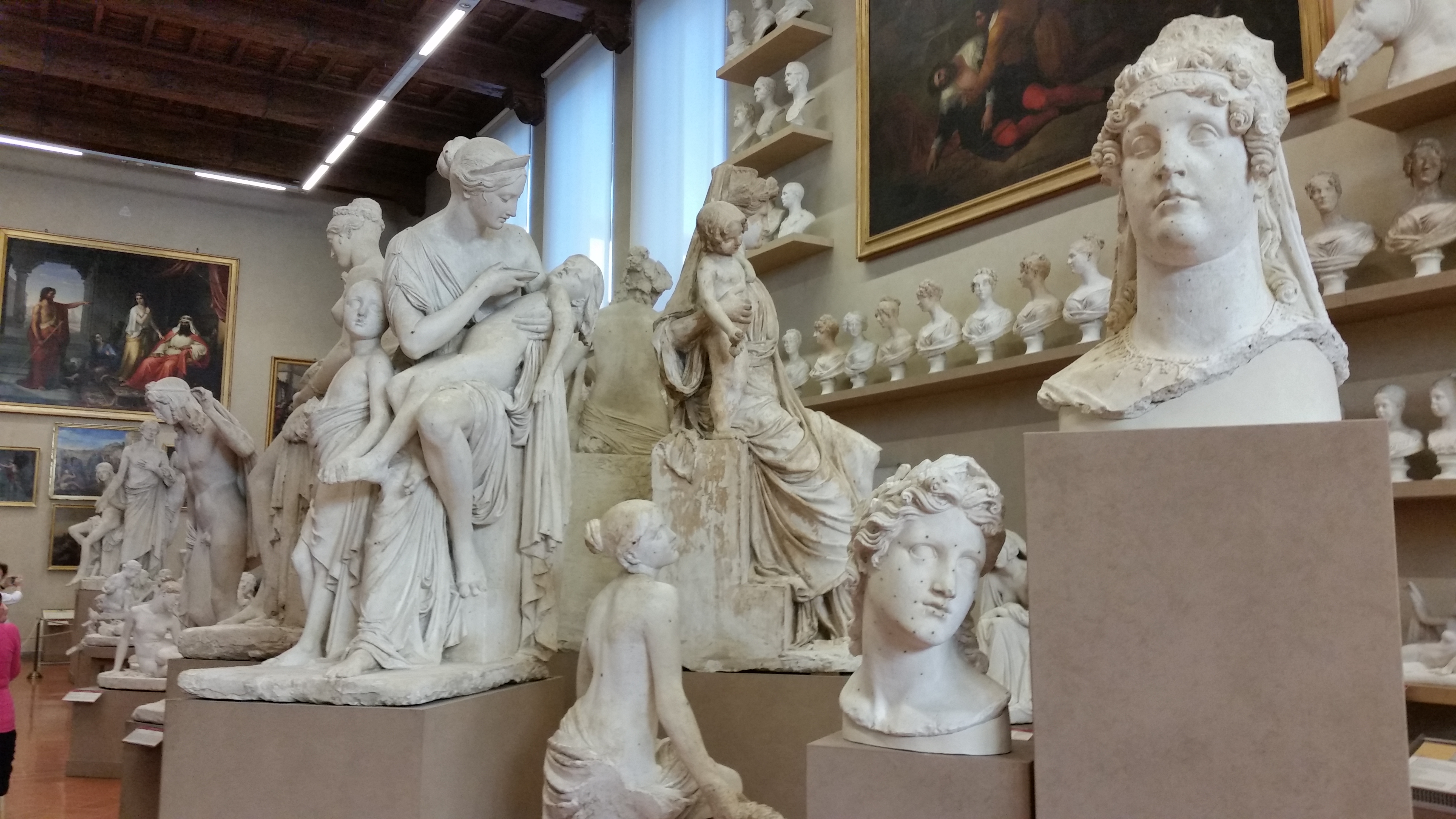 Sculptures lining a hall in the Accademia Gallery, Florence