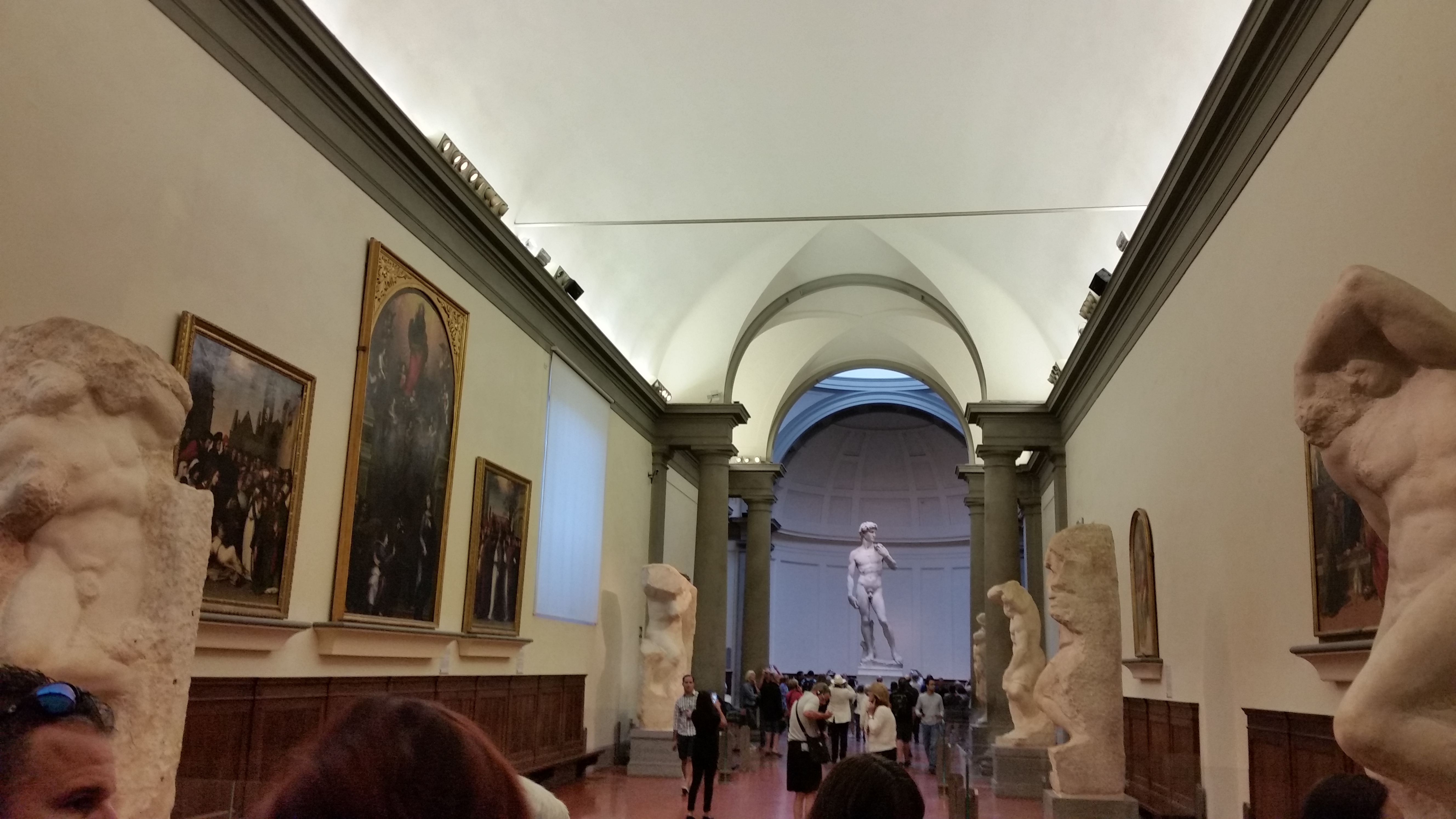 Crowds gathered around Michelangelo's David at the Accademia Gallery in Florence