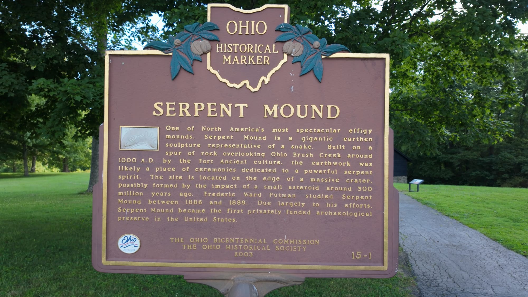 The Ohio Historical Marker at the site, summarizing the mound's discovery, dating, and rescue from destruction