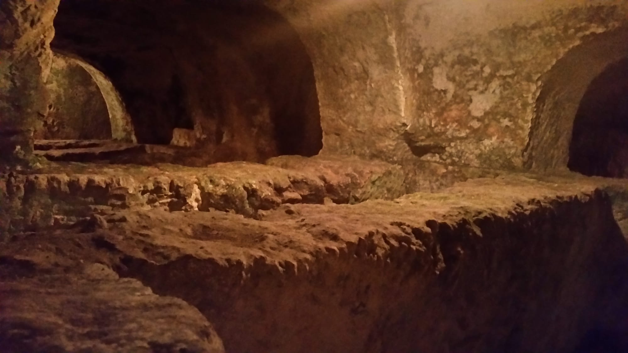 A chamber of arched arcosolium tombs in St. Paul's Catacombs